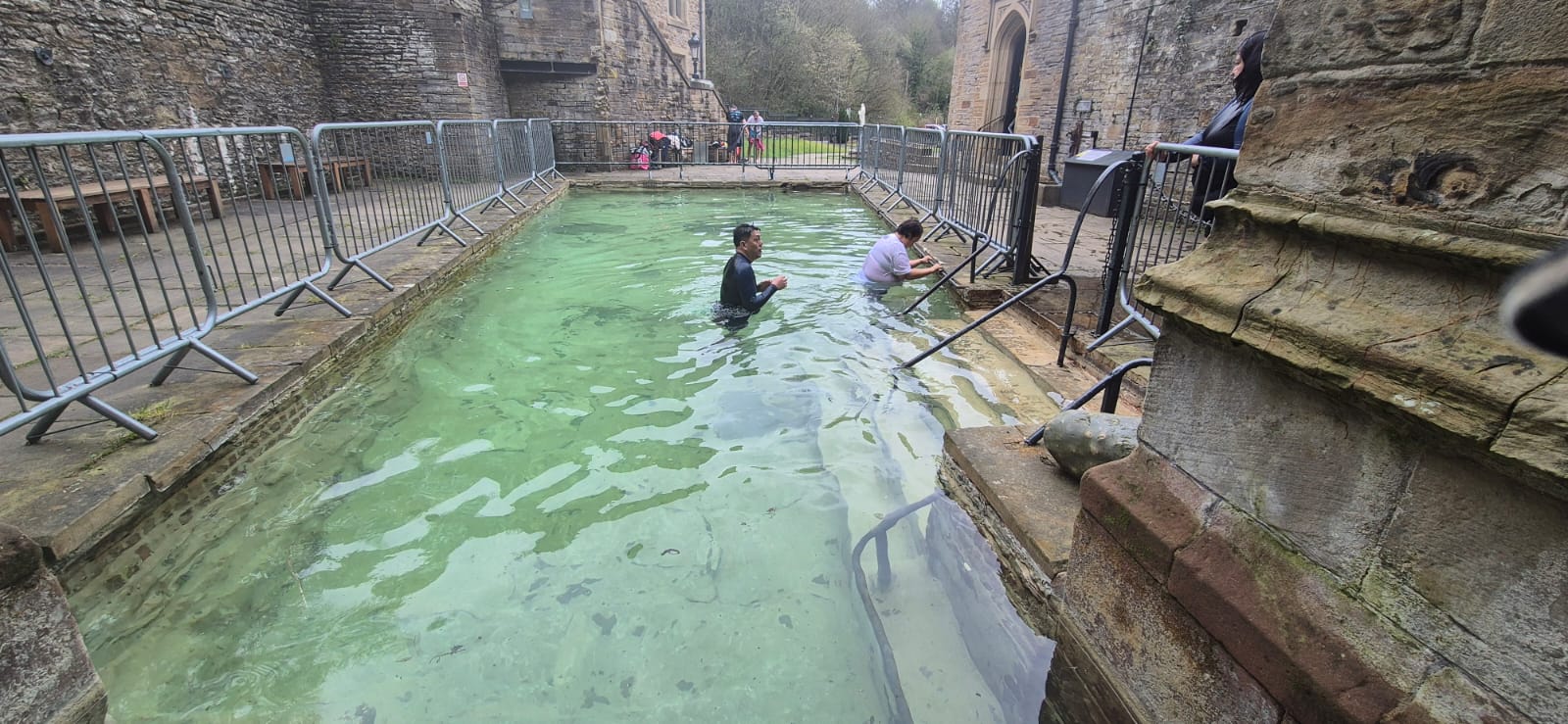Pilgrims bathing in the holy well
